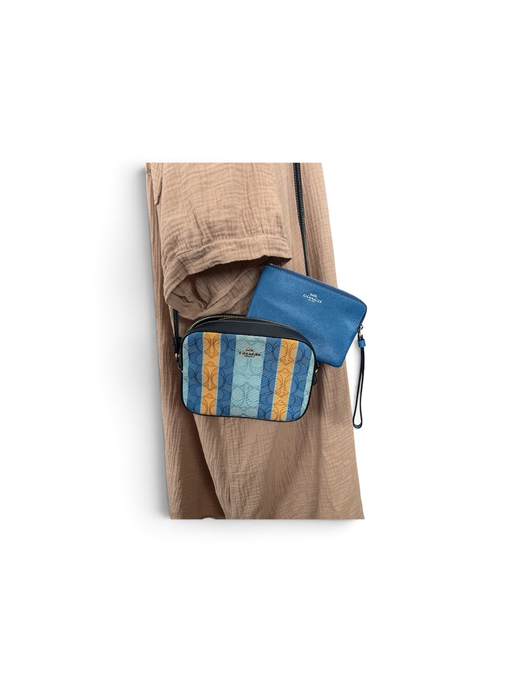 Coach mini Camera bag in yellow and blue stripes and a blue wristlet wallet. - Picture 2 of 7